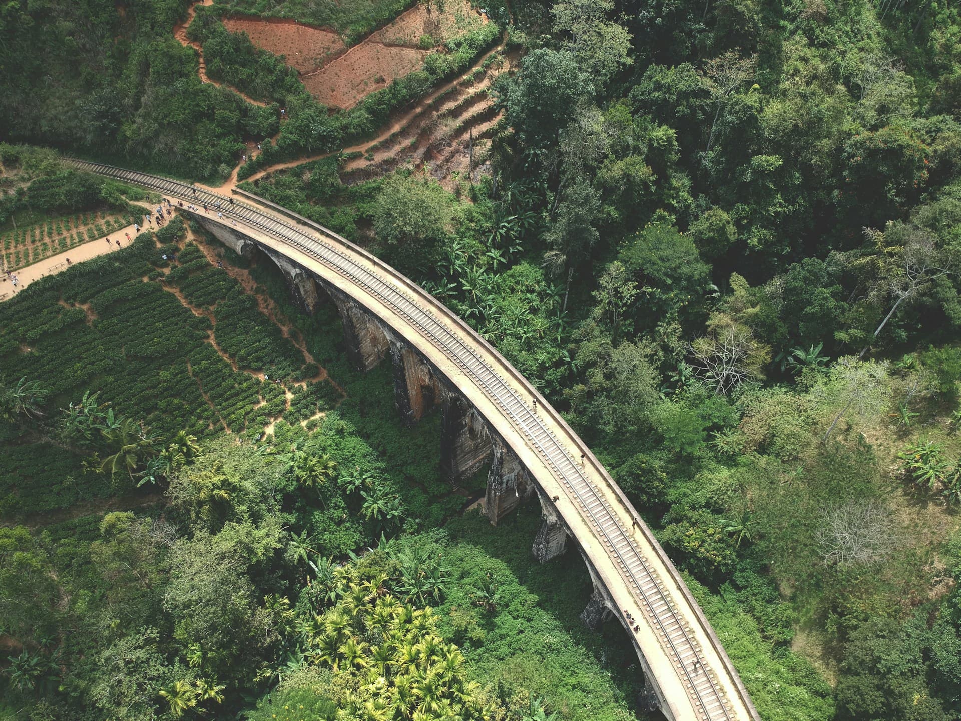 Nine Arch Bridge curving through the lush green hills of Ella, Sri Lanka